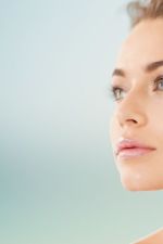 woman with diamond earrings